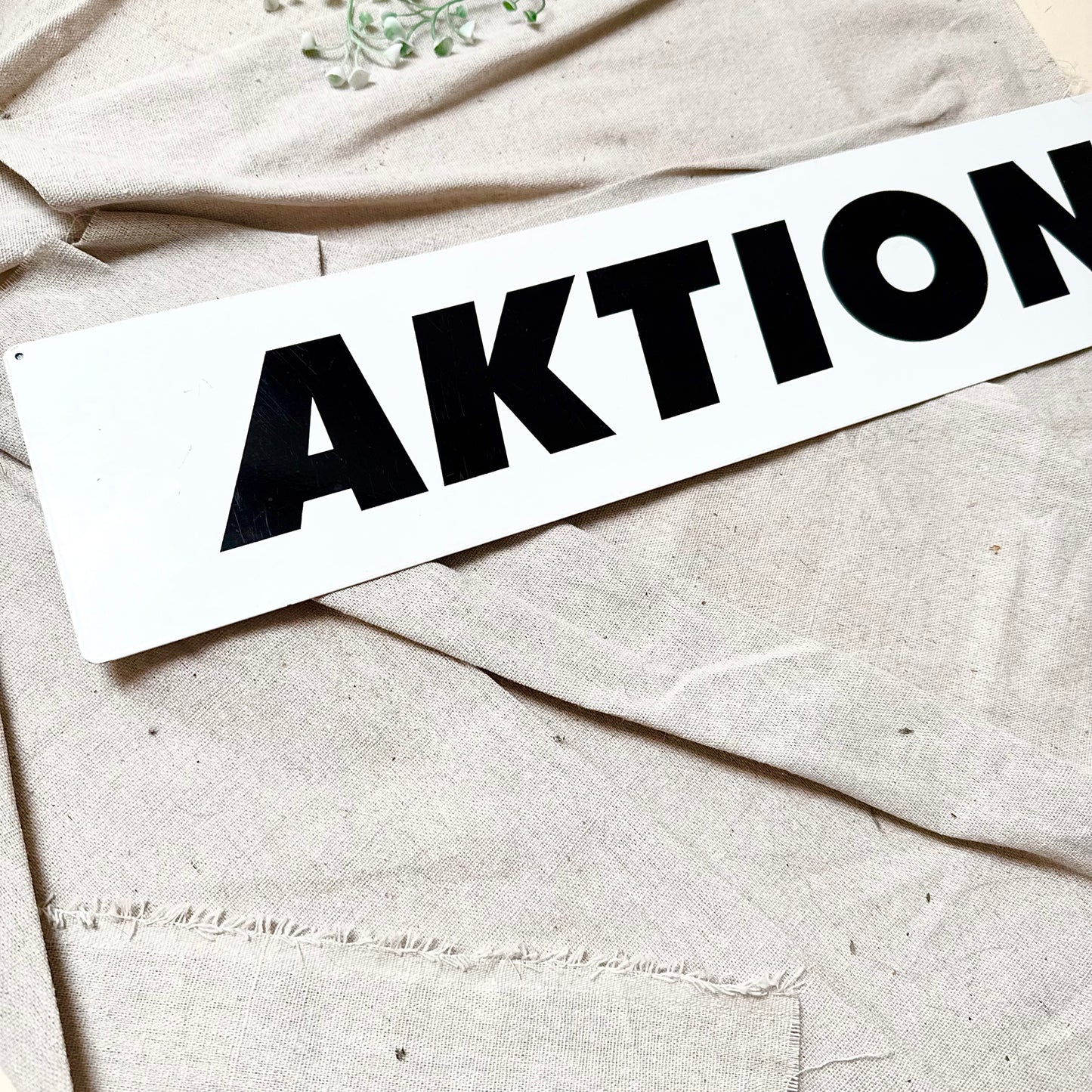 Blechschild „Aktion“