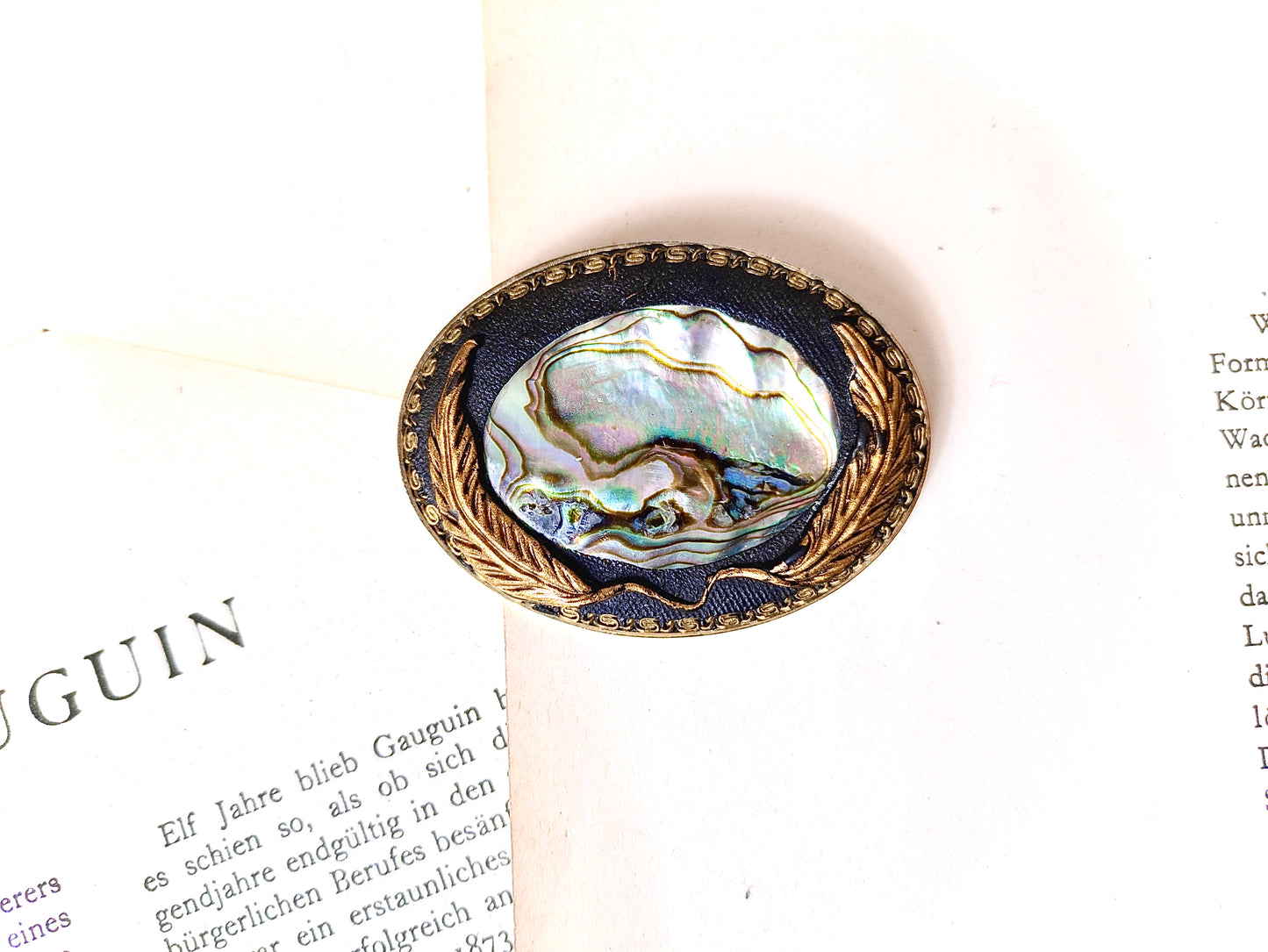 Brooch with shell inlay