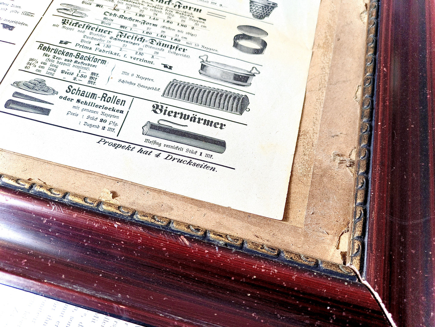 Framed advertisement for kitchen utensils