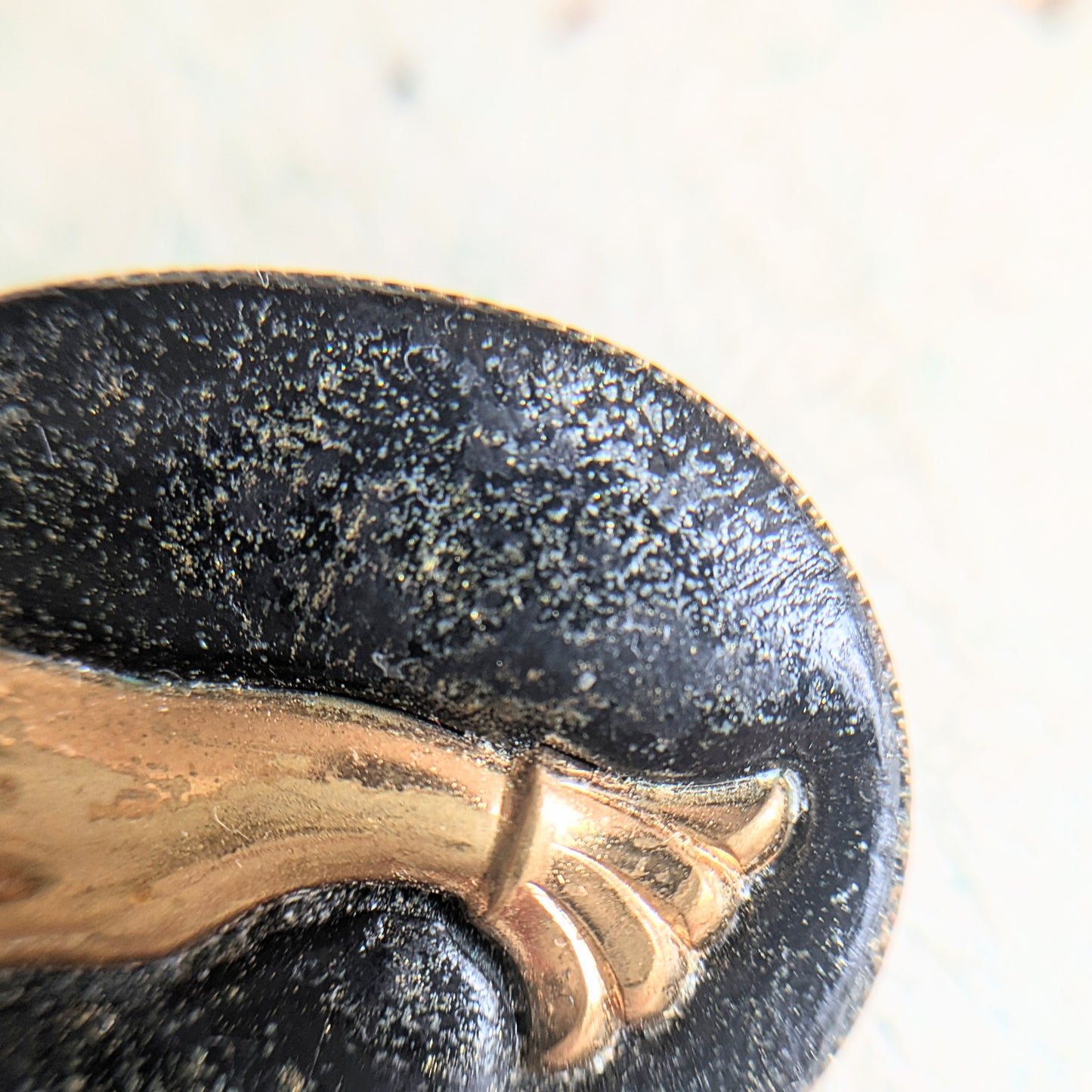 brooch with hand