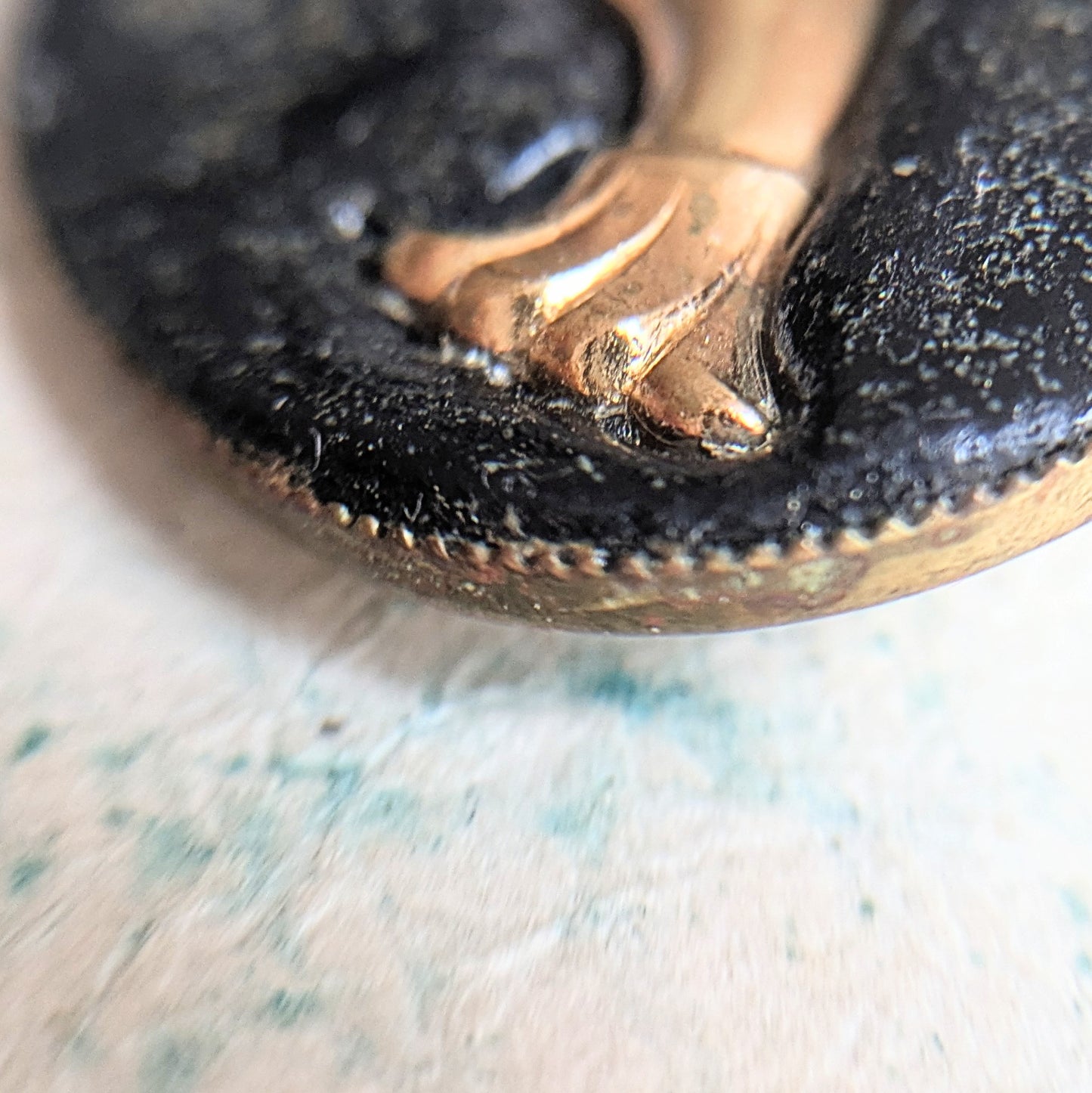 brooch with hand