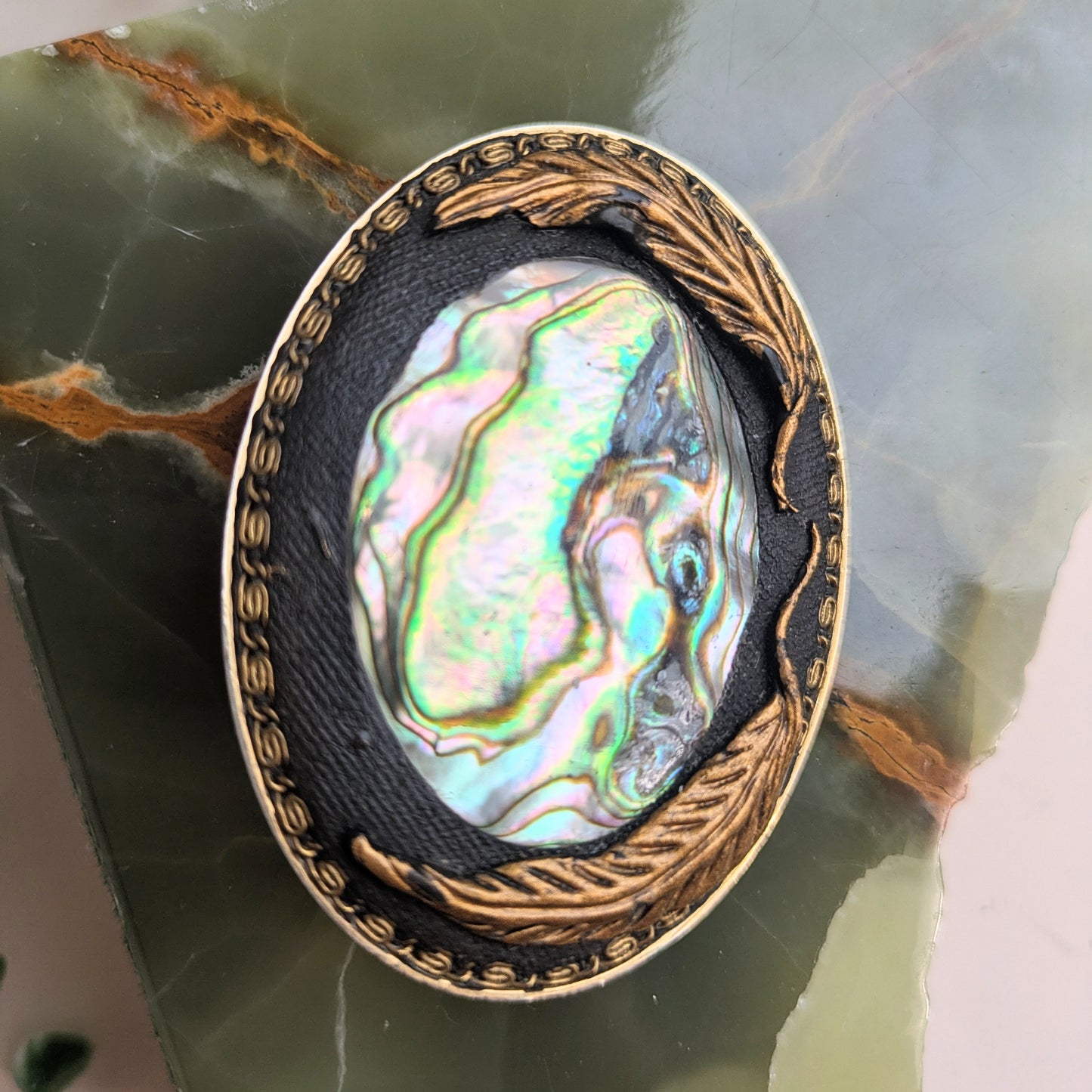 Brooch with shell inlay