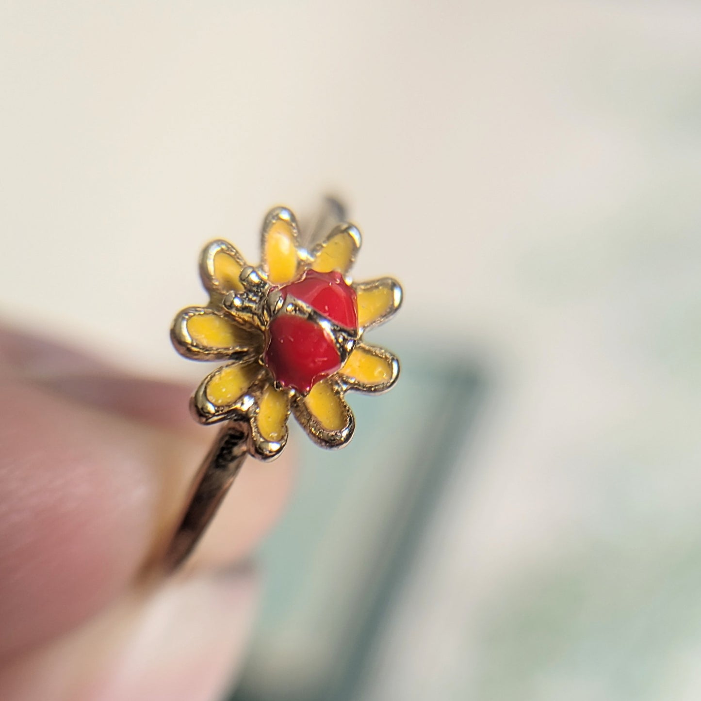Ring red stone in flower