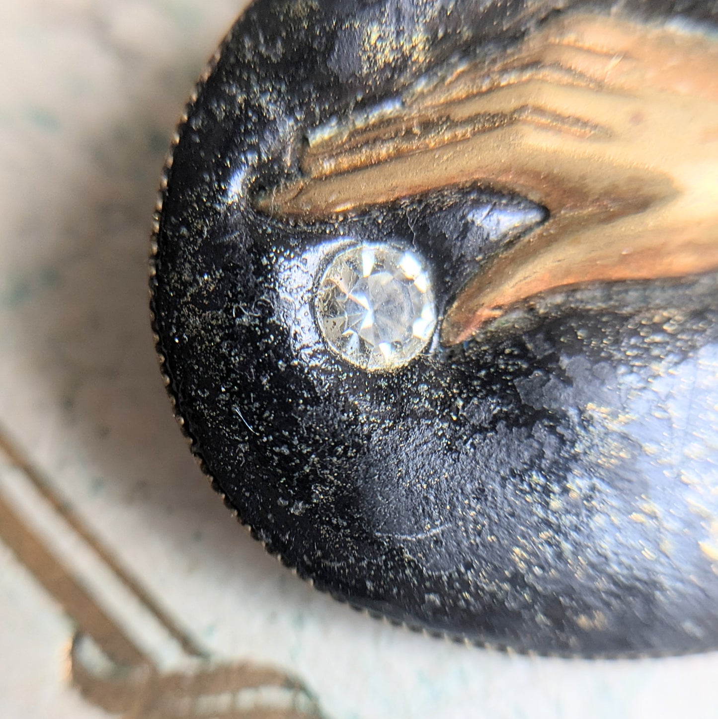 brooch with hand
