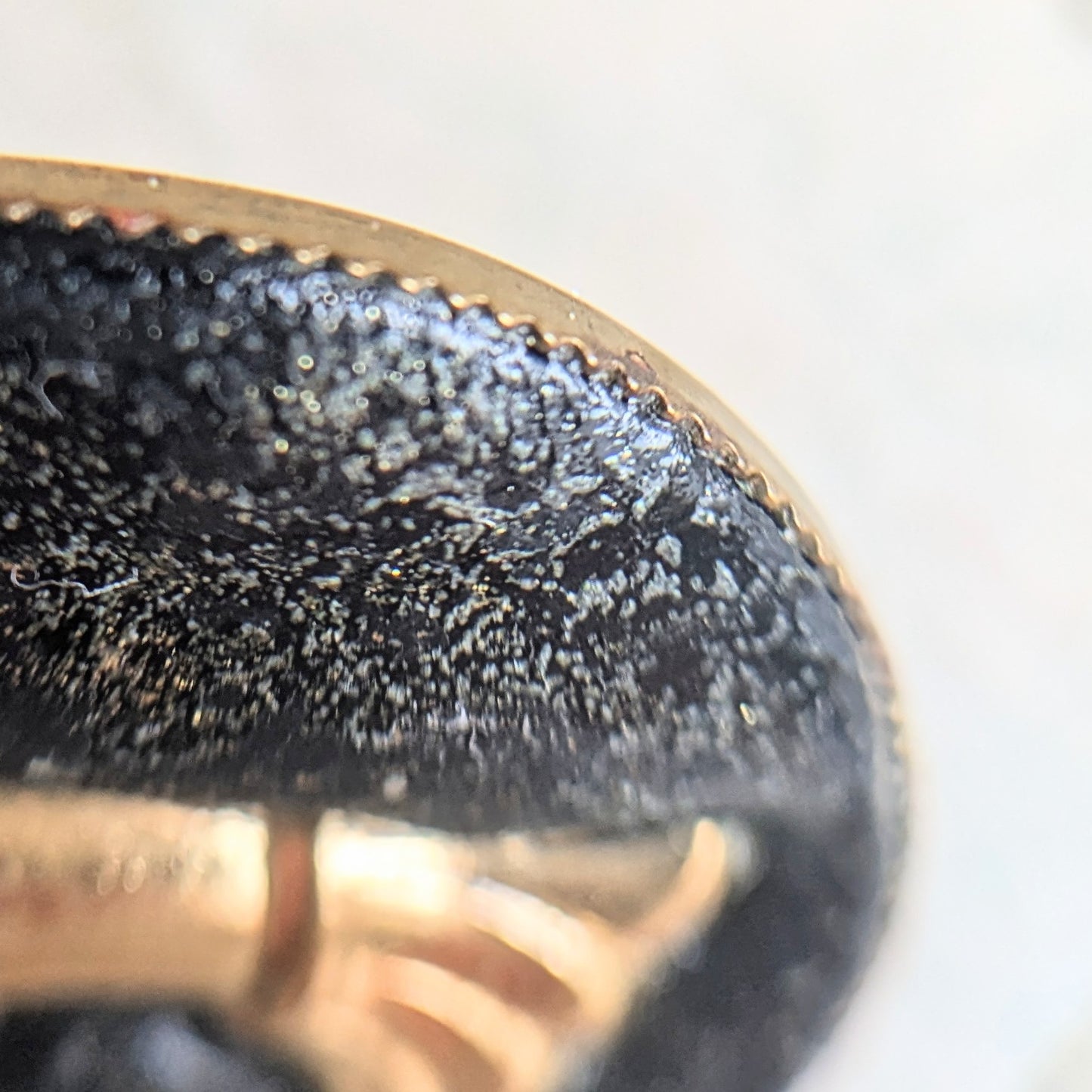 brooch with hand