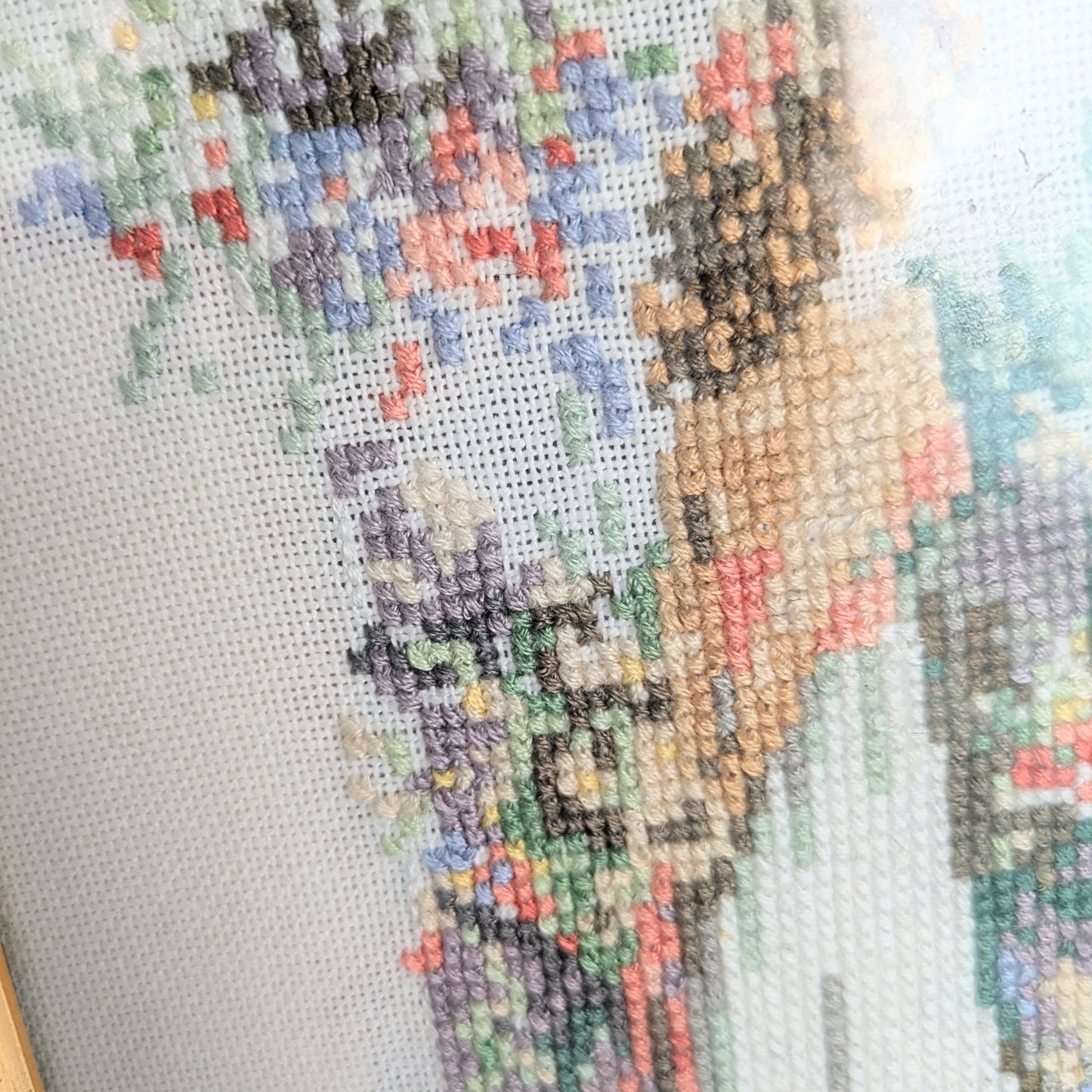 Embroidery picture woman in garden