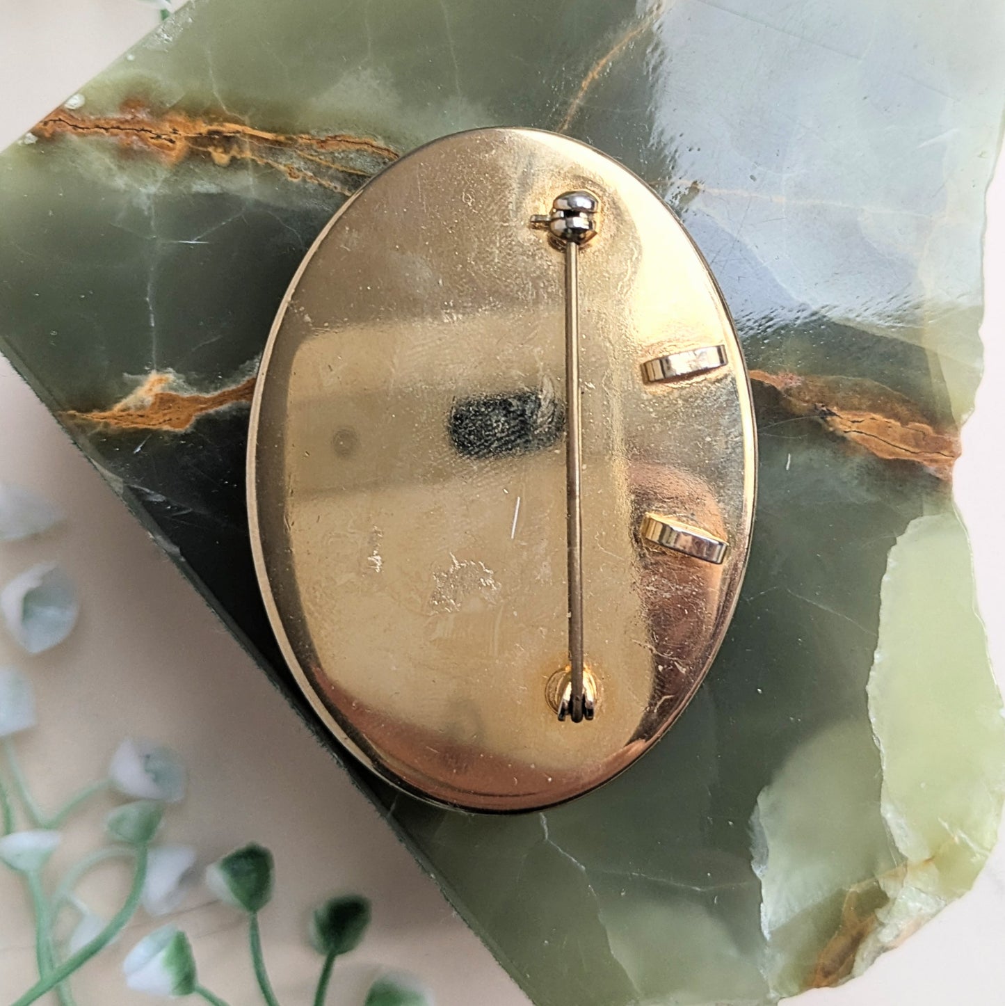 Brooch with shell inlay