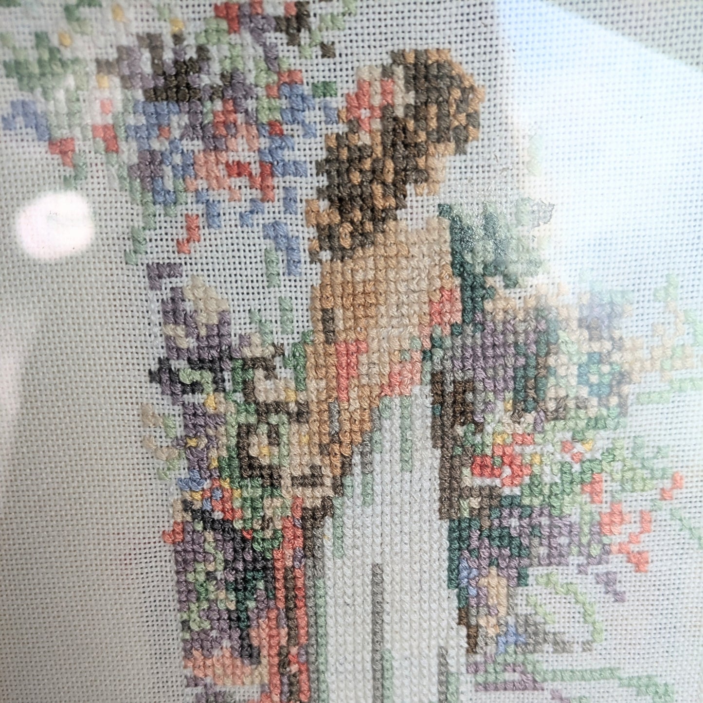 Embroidery picture woman in garden