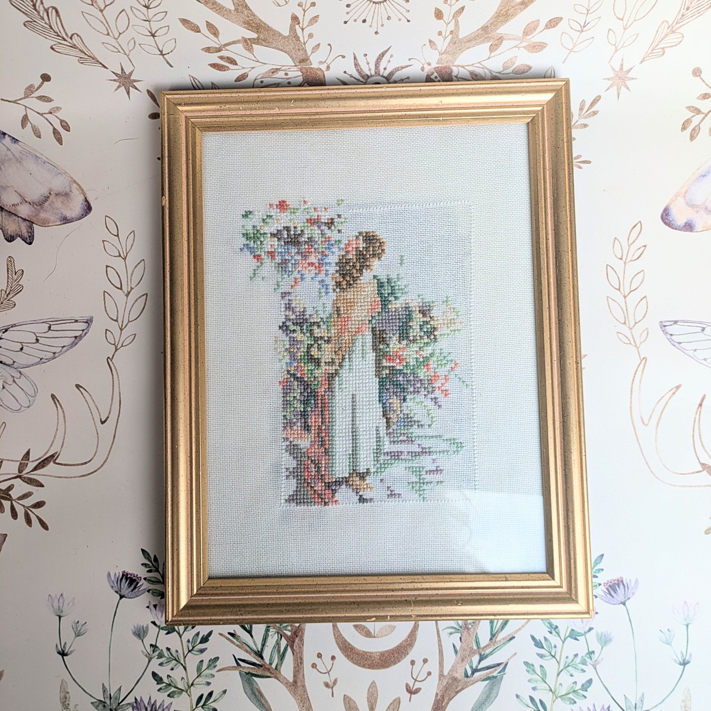 Embroidery picture woman in garden