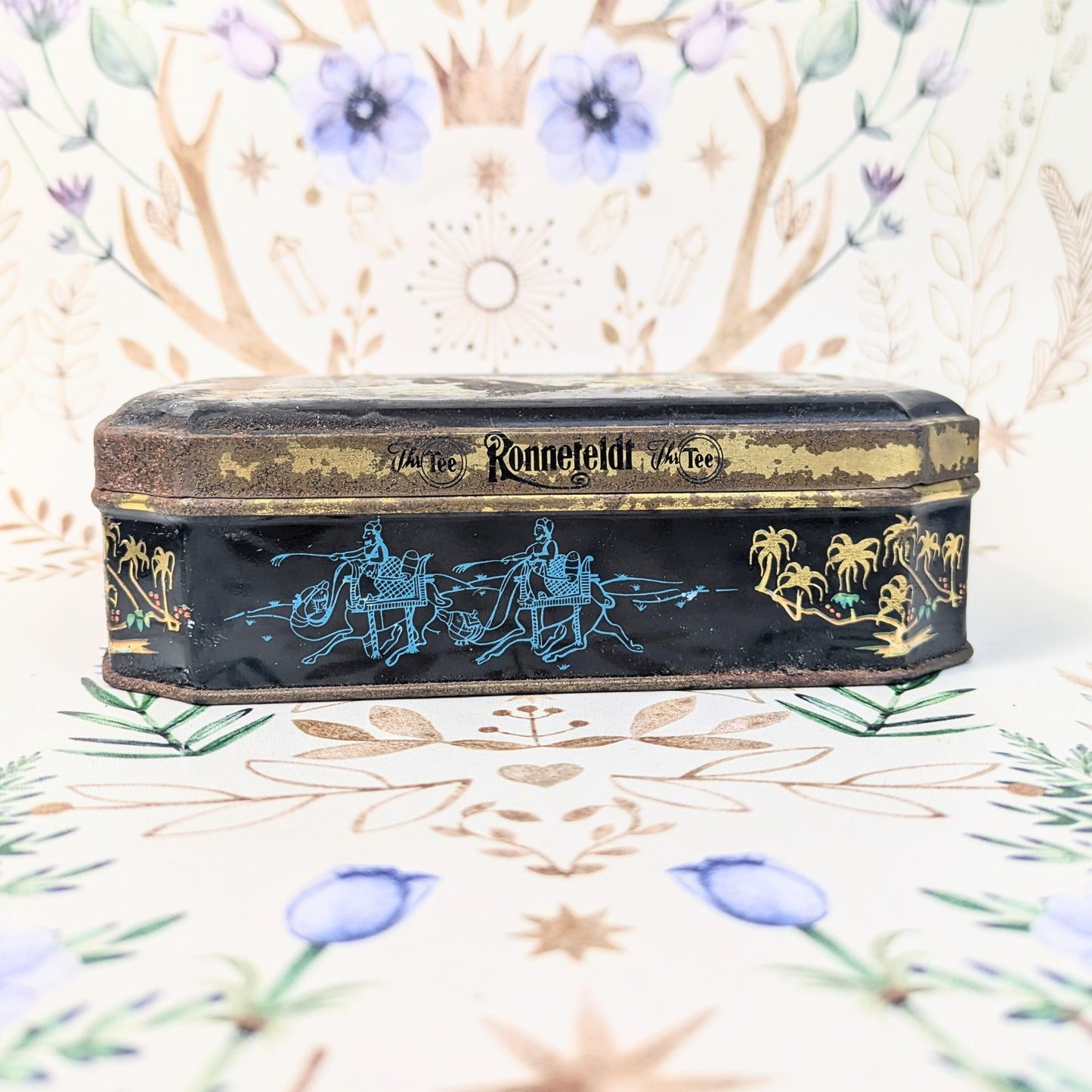 Peacock tea tin