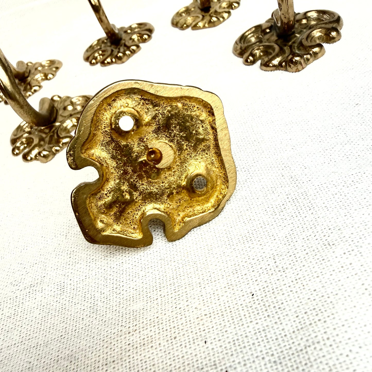Garderobenhaken Schnörkel gold