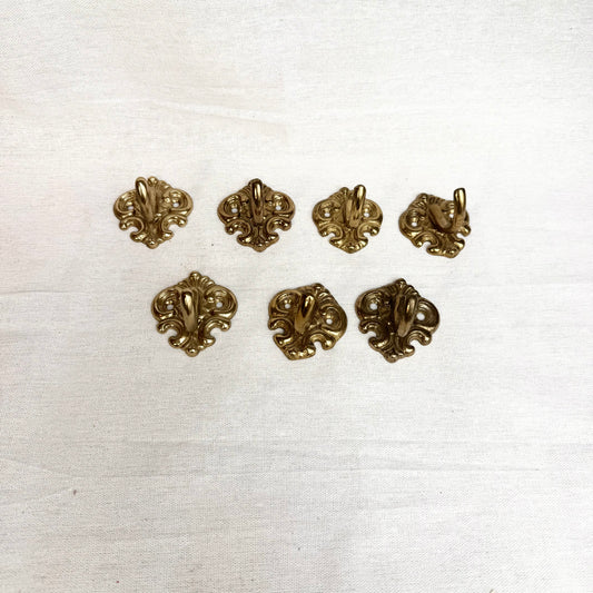 Garderobenhaken Schnörkel gold