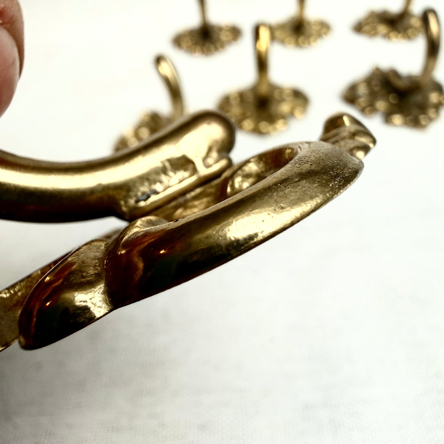 Garderobenhaken Schnörkel gold