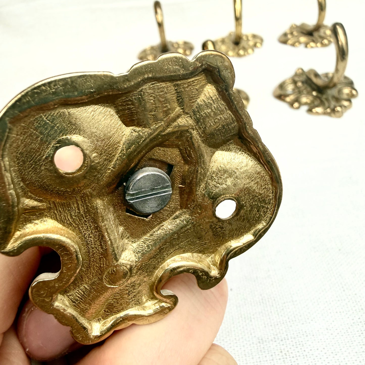 Garderobenhaken Schnörkel gold