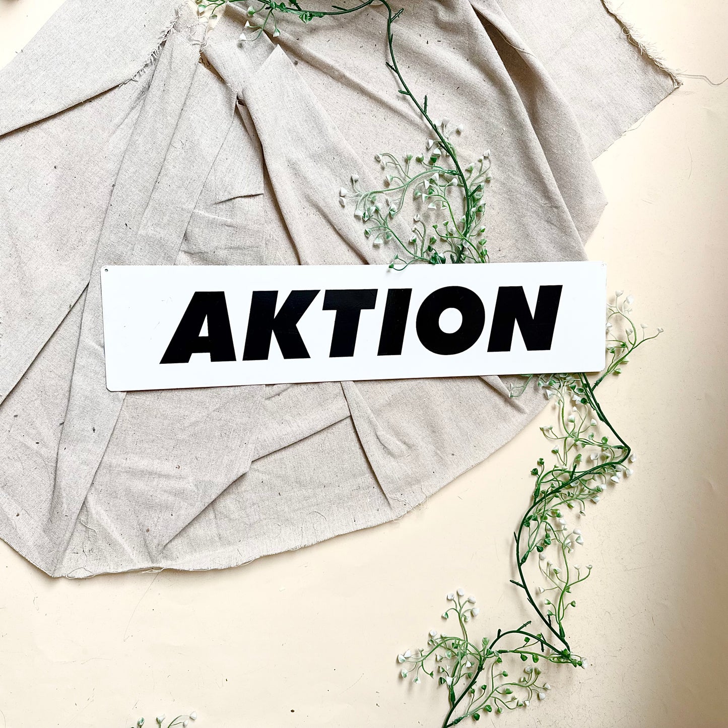 Blechschild „Aktion“