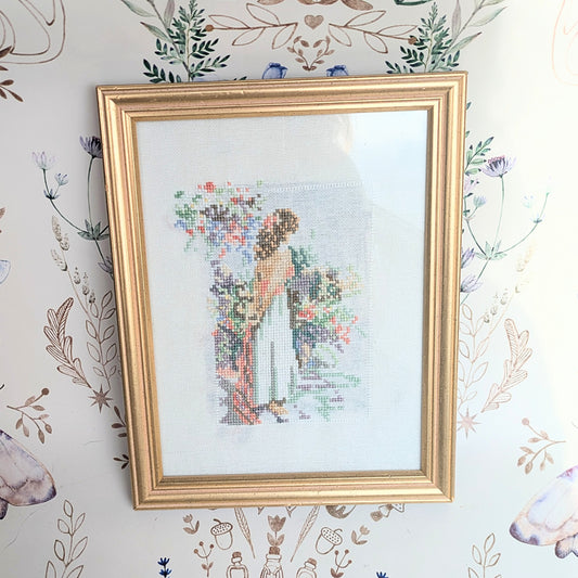 Embroidery picture woman in garden