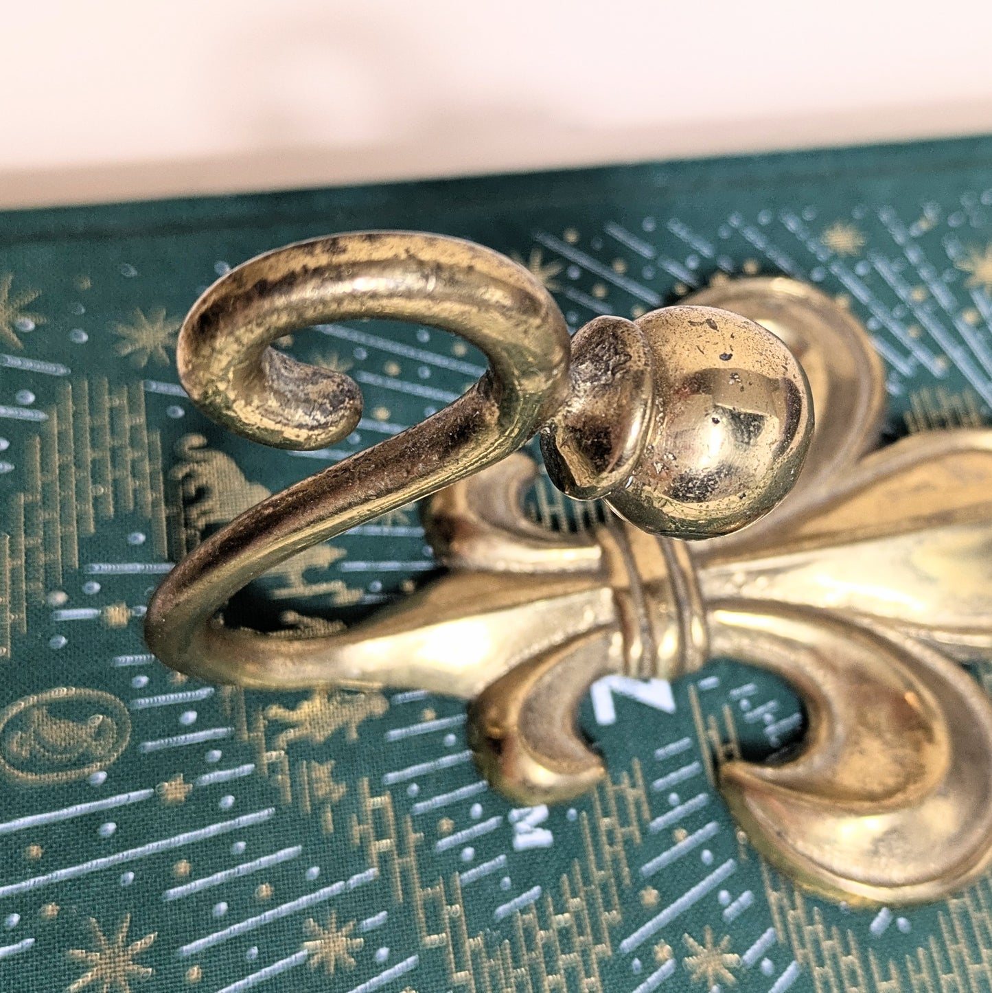 Brass hook lily
