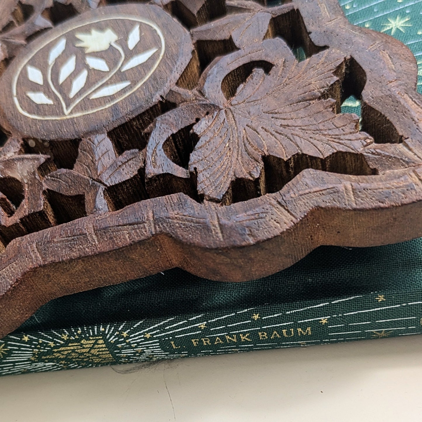 Oriental coaster with inlays