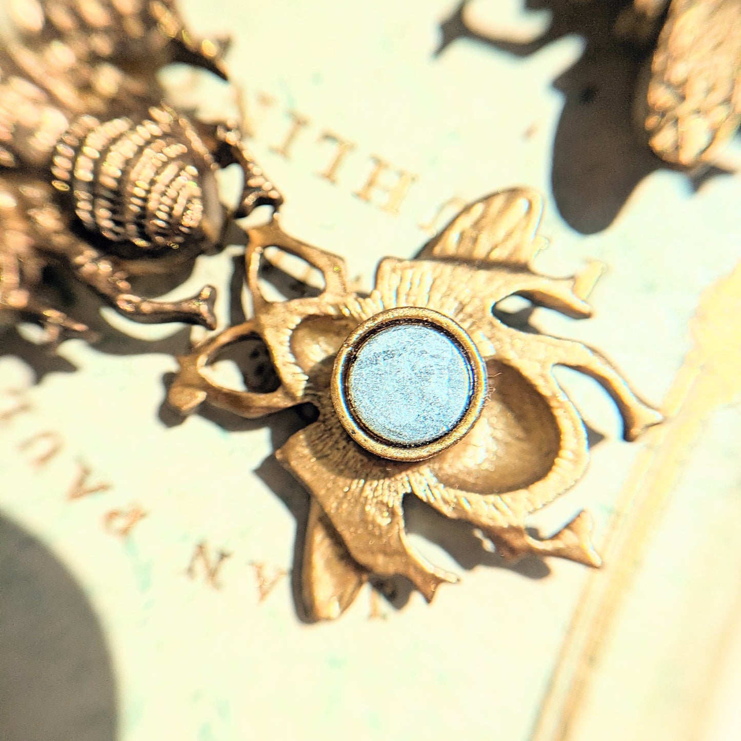 Set of 4 bee magnets made of brass