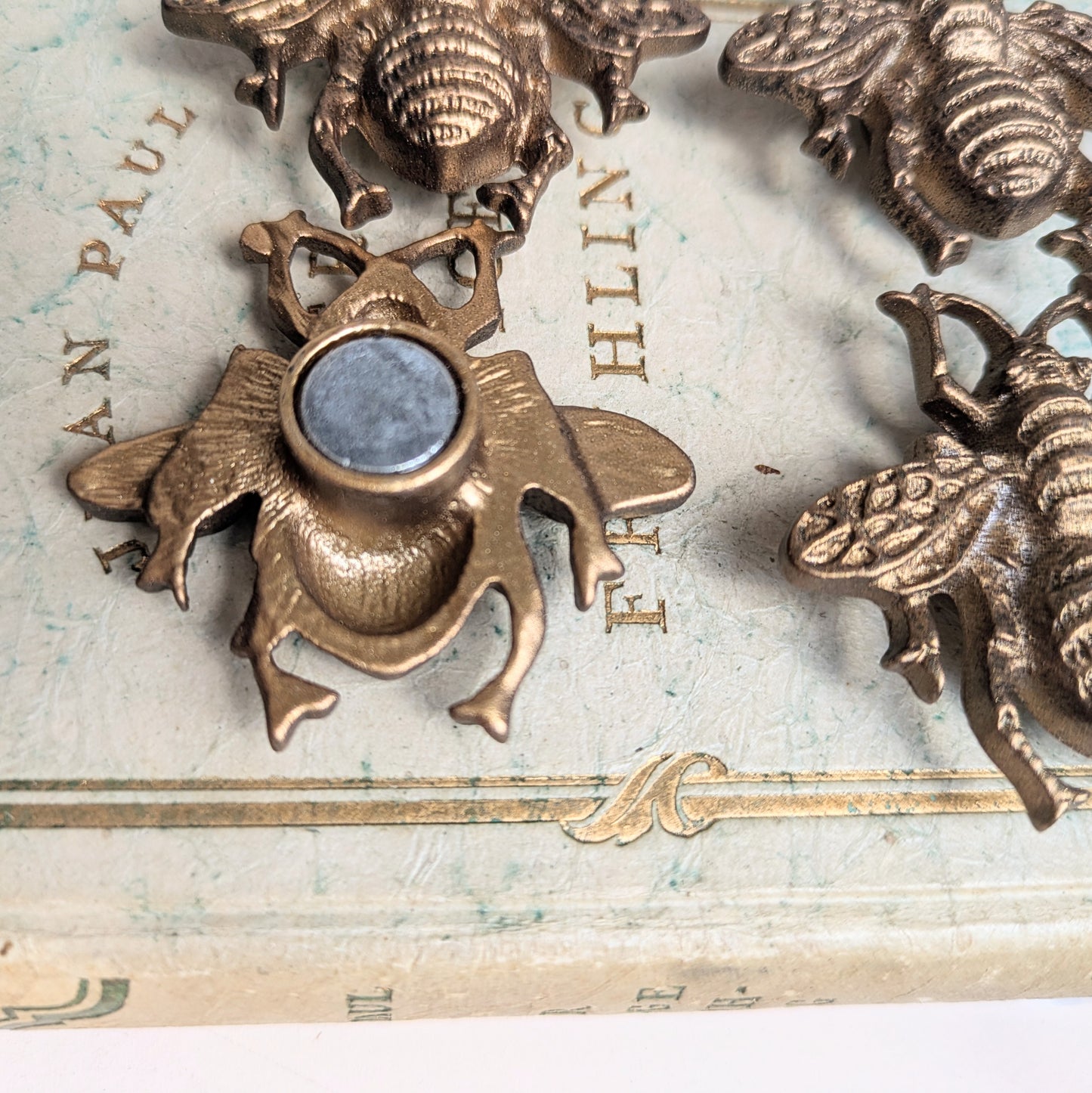 Set of 4 bee magnets made of brass