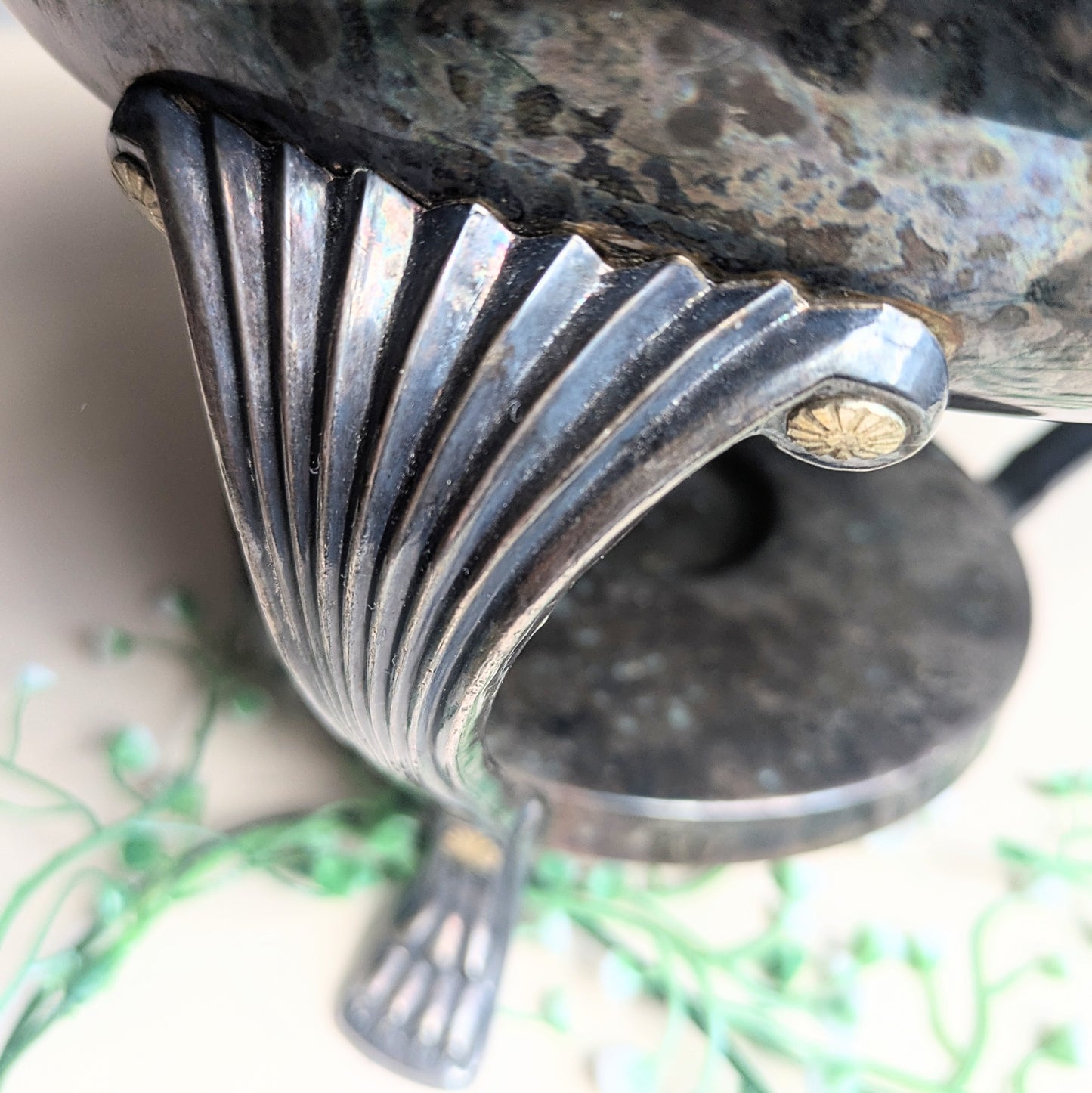 Silver warming container with lion paws