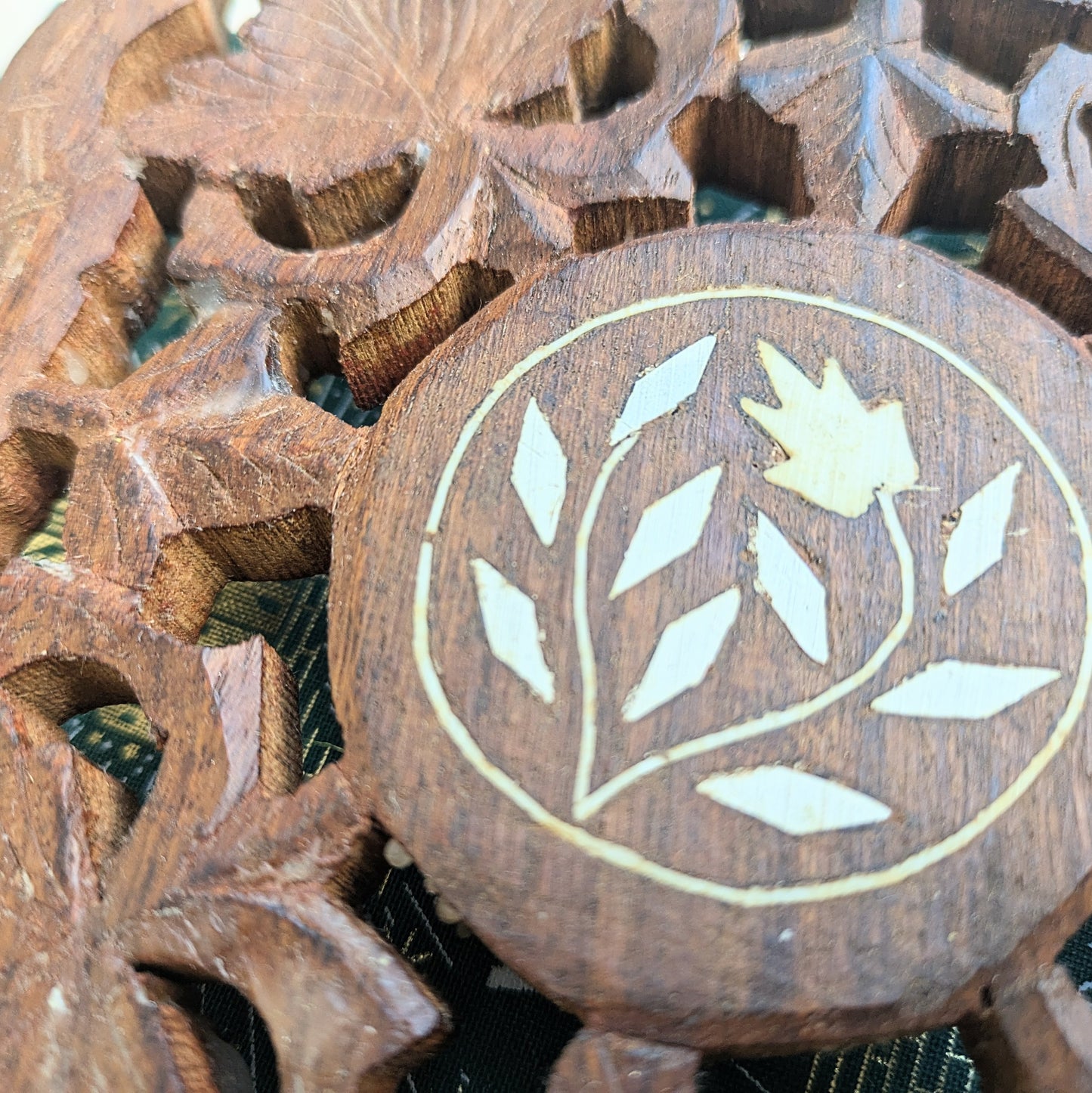 Oriental coaster with inlays