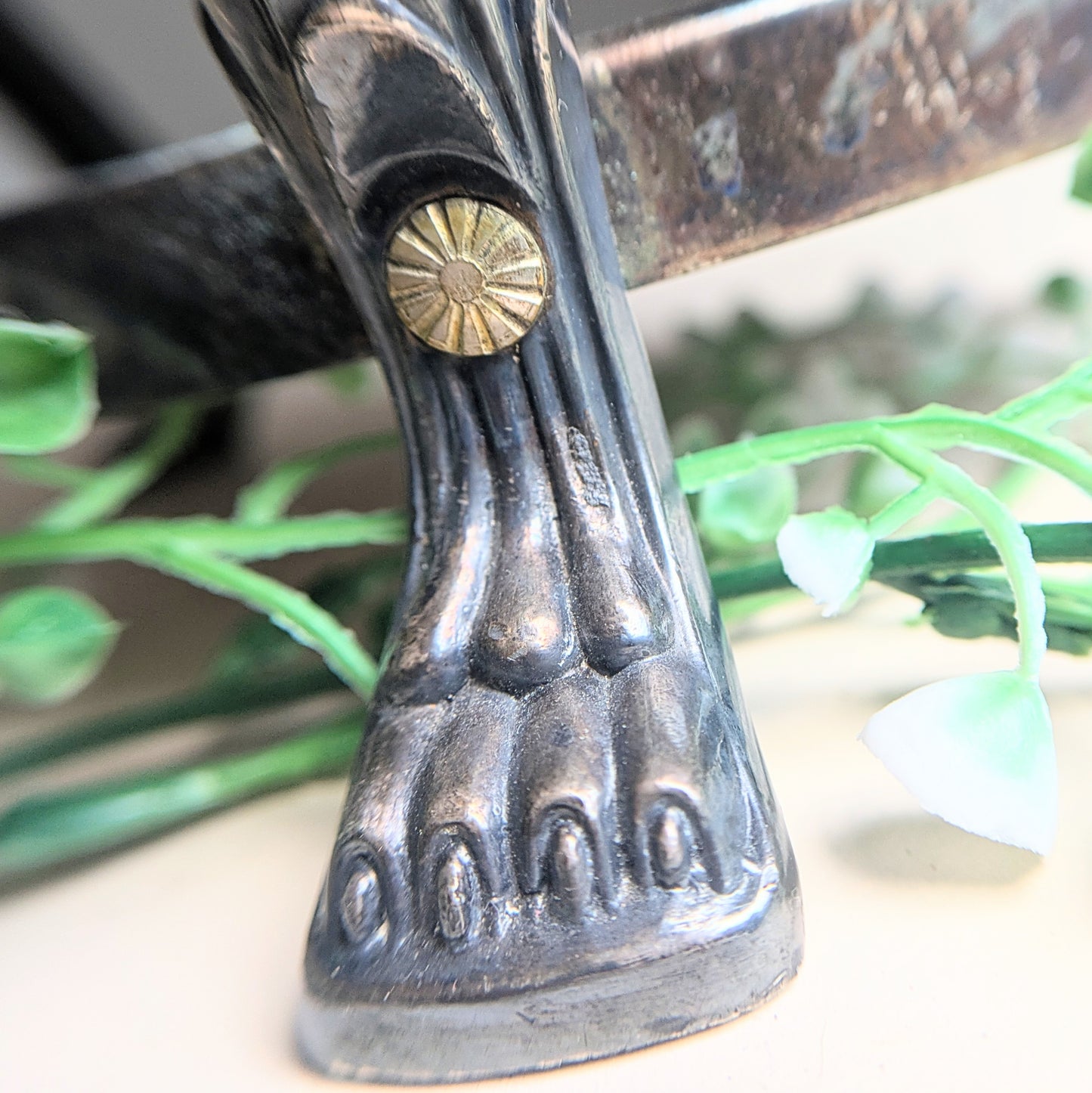 Silver warming container with lion paws